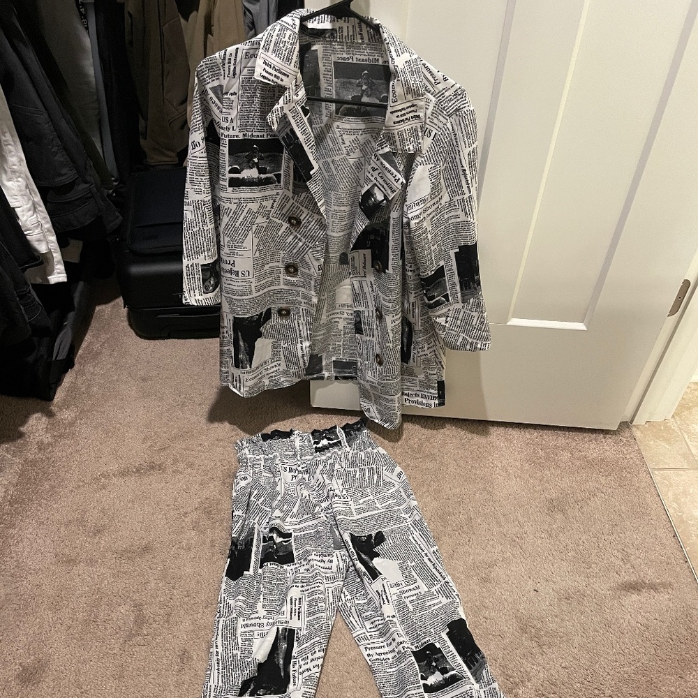 Newspaper suit